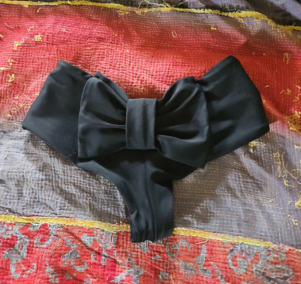 Lolli black bow bikini bottoms size xxs-xs.